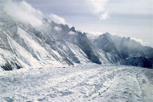 FILE -  This Feb. 1, 2005 file photo shows an aerial view of the Siachen Glacier, which traverses the Himalayan region dividing India and Pakistan, about 750 kilometers (469 miles) northwest of Jammu, India. An avalanche hit the Siachen Glacier in the Indian-controlled portion of Kashmir early Wednesday,Feb.3, 2016 trapping 10 Indian army soldiers in the snow. (AP Photo/Channi Anand, File)