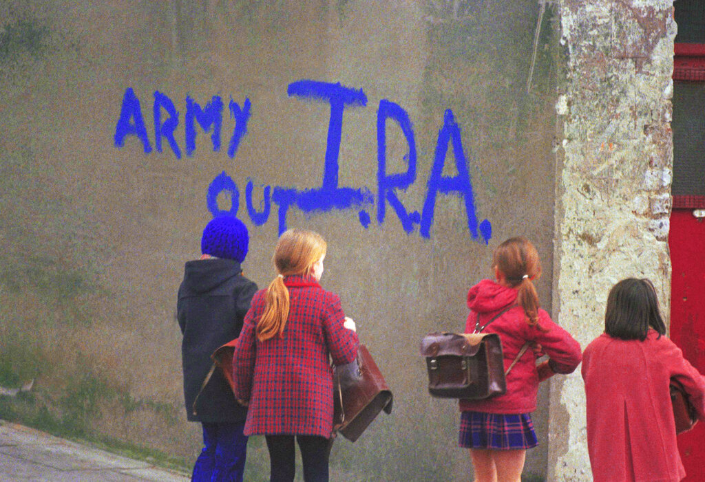 School children in Londonderry, Northern Ireland in February 1972. Note IRA graffiti on walls. (AP Photo/Michel Laurent)