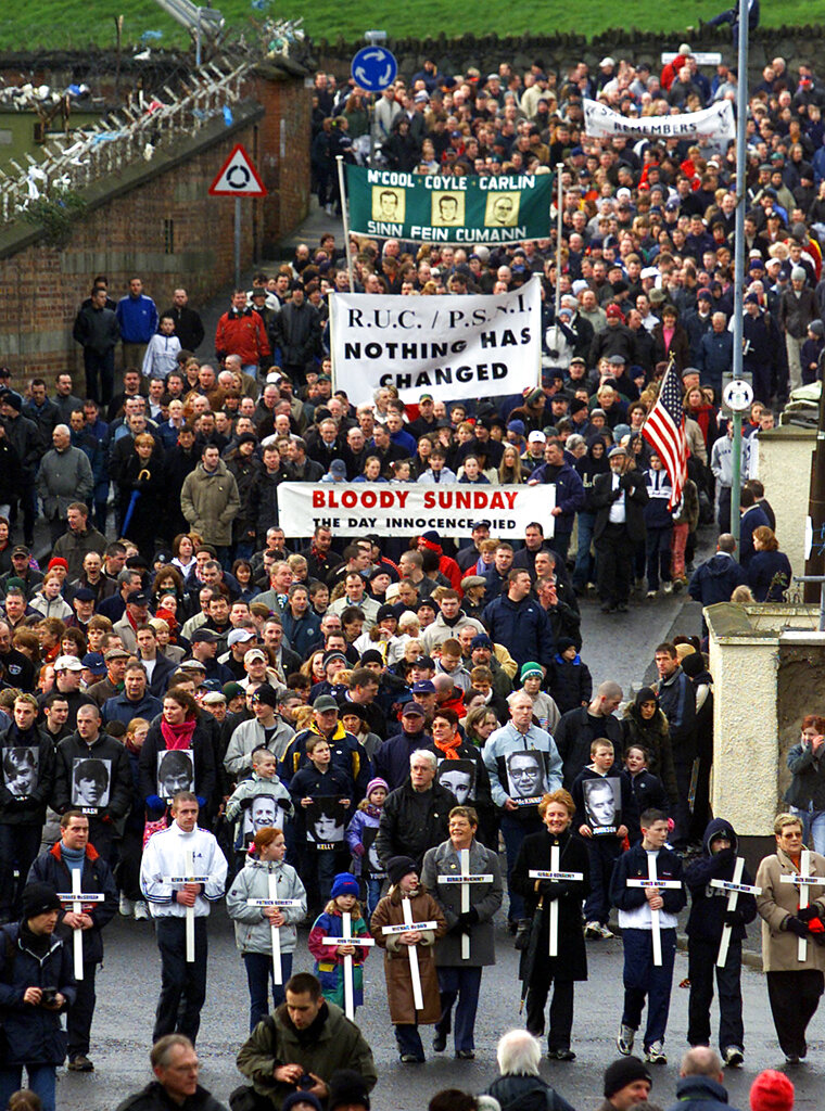 Thousands of people march in the 30th anniversary rally of Bloody Sunday in Londonderry, northern Ireland, Sunday, Feb. 3, 2002. (AP Photo/Peter Morrison)