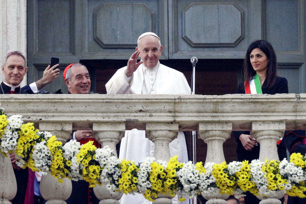 Pope Francis, flanked by Rome's Mayor Virginia Raggi, right, delivers his speech during his visit to the Campidoglio, Capitol hill, in Rome, March 26, 2019. (AP Photo/Gregorio Borgia)