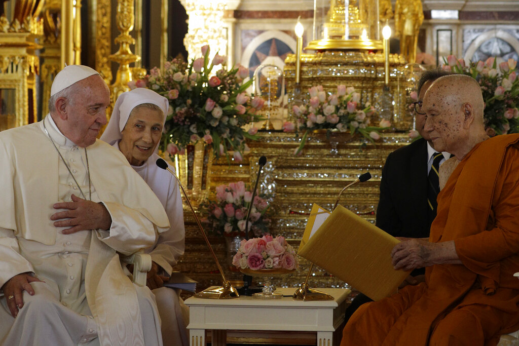 Pope Francis, left, and his cousin, Sister Ana Rosa Sivori visit the Supreme Buddhist Patriarch at Was Ratchabophit Sathit Maha Simaram Temple, Thursday, Nov. 21, 2019, in Bangkok, Thailand. (AP Photo/Gregorio Borgia)