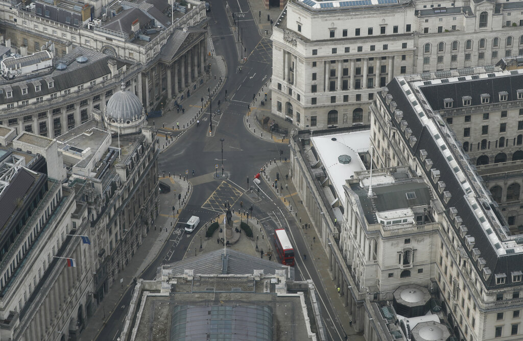 A view over the City of London looking at the Bank of England, right, from the 59th floor of 22 Bishopsgate in London, Thursday, April 1, 2021. When the pandemic struck, about 540,000 workers vanished from London's financial hub almost overnight. The area known as 