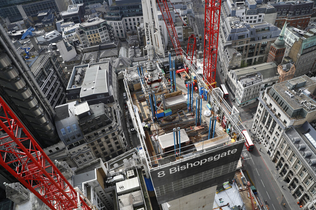 A view looking down from the top of the north central column of the 8 Bishopsgate development in London, Thursday, April 1, 2021. When the pandemic struck, about 540,000 workers vanished from London's financial hub almost overnight. Developers of 8 Bishopsgate, are confident that when construction ends late next year, workers and firms will return to fill all 50 floors of the gleaming new office space. (AP Photo/Alastair Grant)