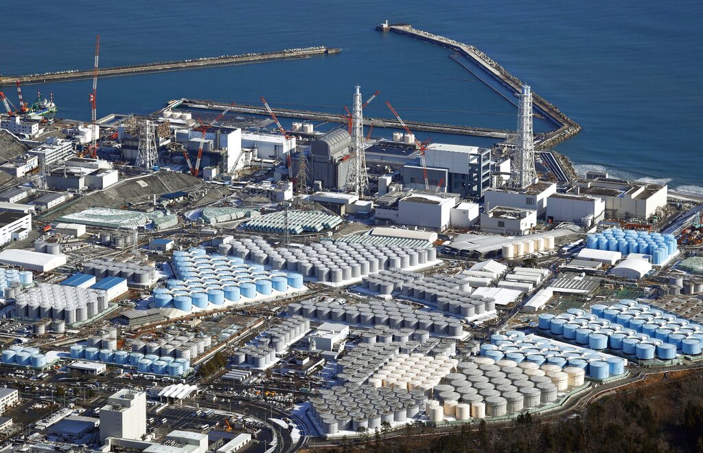 An aerial photo shows Fukushima Daiichi nuclear power plant in Okuma town, Fukushima Prefecture in January, 2021. The Japanese government has decided to get rid of the massive amounts of treated but still radioactive water stored in tanks at the wrecked Fukushima nuclear plant by releasing it into the Pacific ocean, a conclusion widely expected but delayed for years amid protests and safety concerns. Prime Minister Yoshihide Suga on Wednesday, April 7, 2021, told top fisheries association officials that his government believes the release to sea is the most realistic option and a final decision will be made “with days.”(Kota Endo/Kyodo News via AP)