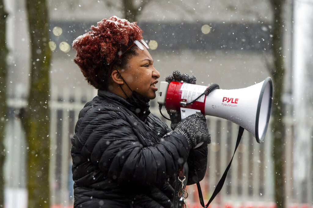 Detroit Will Breathe organizer Nakia Wallace speaks outside Detroit Police Department headquarters at Third and Michigan in Detroit after Minneapolis police officer Derek Chauvin was found guilty for the murder of George Floyd on Tuesday, April 20, 2021. (Jacob Hamilton/Ann Arbor News via AP)