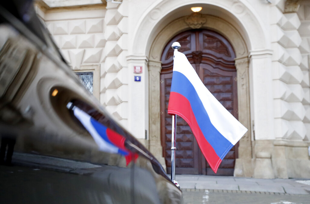 Car of Russia's ambassador to Prague, Aleksandr Zmeyevsky is parked in front of the Foreign Ministry in Prague, Czech Republic, Wednesday, April 21, 2021. The ambassador was summoned by newly appointed Foreign Minister Kulhanek to be handed the Czech protest against the Russian expulsion move, which the Czechs consider disproportionate, saying it has paralyzed the Czech Embassy in Moscow following the fierce diplomatic crisis over allegations that Russian agents were involved in a massive Czech ammunition depot explosion. (AP Photo/Petr David Josek)
