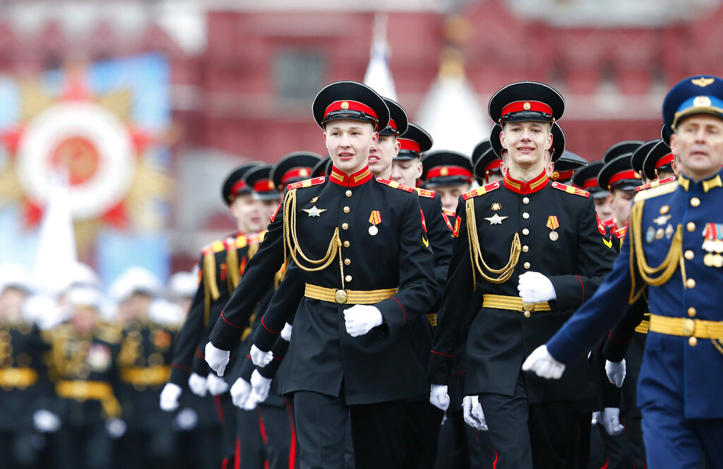 Russian military cadets march toward Red Square during the Victory Day military parade in Moscow, Russia, Sunday, May 9, 2021, marking the 76th anniversary of the end of World War II in Europe. (AP Photo/Alexander Zemlianichenko)