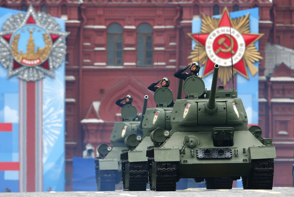 Soviet tanks T-34 roll in Red Square during the Victory Day military parade in Moscow, Russia, Sunday, May 9, 2021, marking the 76th anniversary of the end of World War II in Europe. (AP Photo/Alexander Zemlianichenko)
