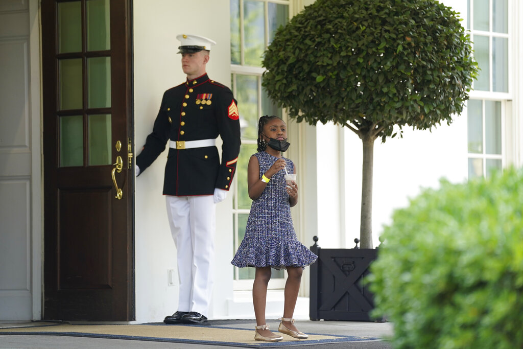 Gianna Floyd, the daughter of George Floyd, walks out of the West Wing door at the White House, Tuesday, May 25, 2021, in Washington. (AP Photo/Evan Vucci)