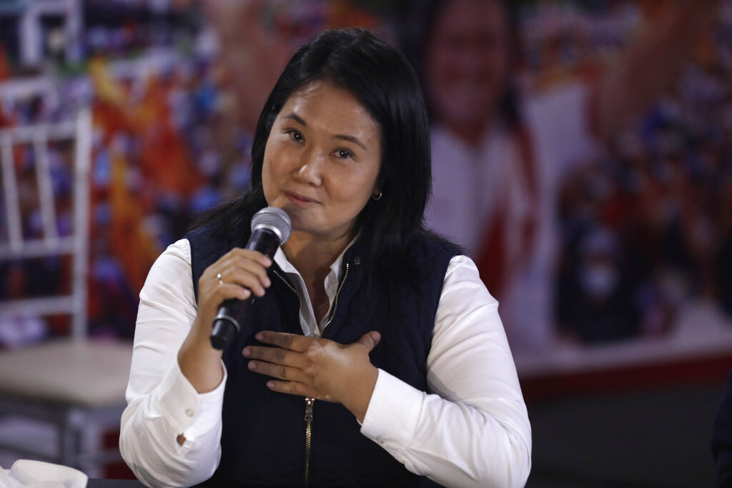 Presidential candidate Keiko Fujimori speaks from her campaign headquarters in Lima, Peru, Monday, June 7, 2021, the day after a presidential runoff election. With 95% of ballots tallied, presidential candidate Pedro Castillo has a narrow lead over Fujimori, according to official results. (AP Photo/Guadalupe Pardo)