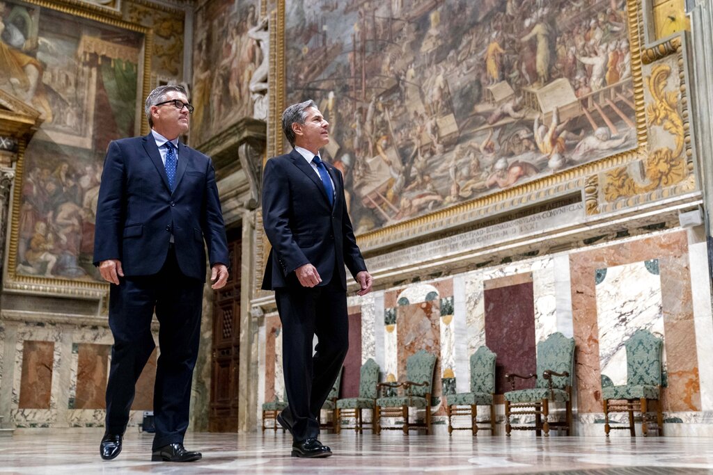 Secretary of State Antony Blinken, right, accompanied by Chargé d'Affaires of the U.S. Embassy to the Holy See Patrick Connell, left, gets a tour of the Sala Regia at the Vatican in Rome, Monday, June 28, 2021. Blinken is on a week long trip in Europe traveling to Germany, France and Italy. (AP Photo/Andrew Harnik, Pool)