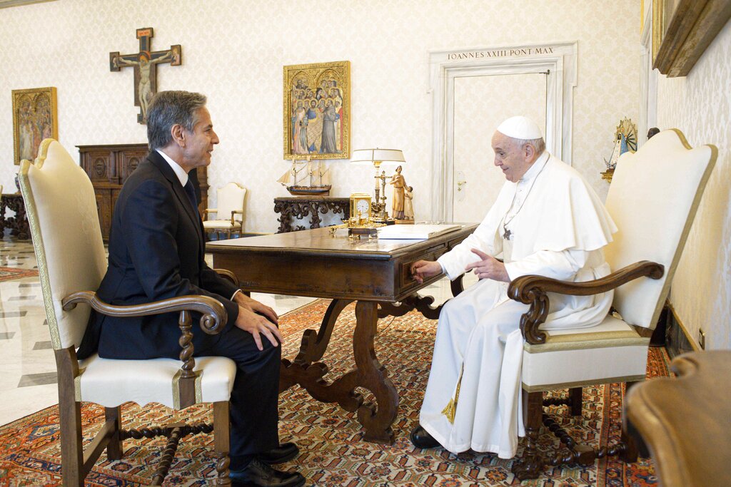 Pope Francis talks with Secretary of State Antony Blinken, as they meet at the Vatican, Monday, June 28, 2021. Blinken is on a week long trip in Europe traveling to Germany, France and Italy. (Vatican Media via AP Photo)