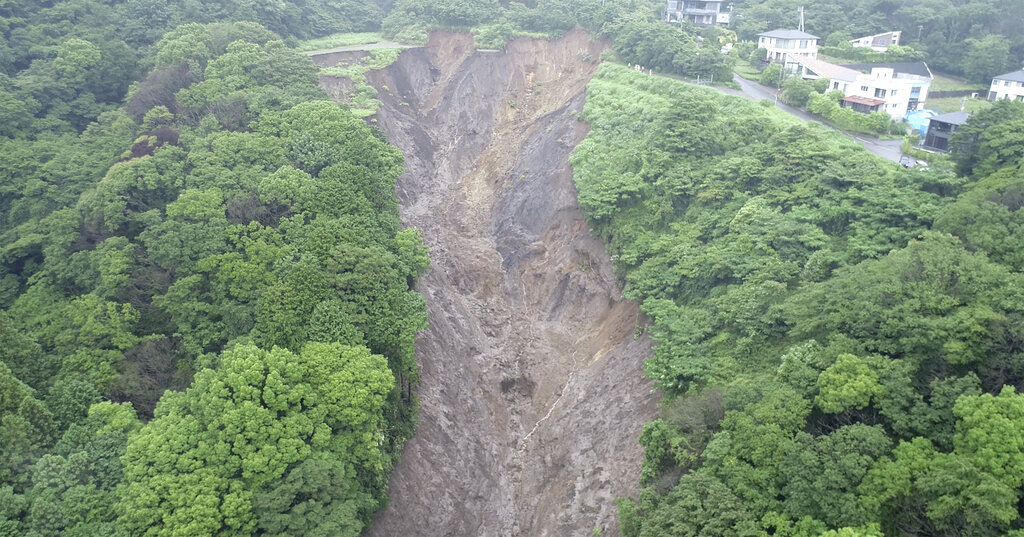 This image from a video, taken by drone and provided by Shizuoka Prefecture, shows an area of where a mudslide started at Izusan in Atami, Shizuoka prefecture, southwest of Tokyo, Saturday evening, July 3, 2021. Rescue workers slogged through mud and debris Monday looking for missing people since the giant landslide ripped through the Japanese seaside resort town. (Shizuoka Prefecture via AP)