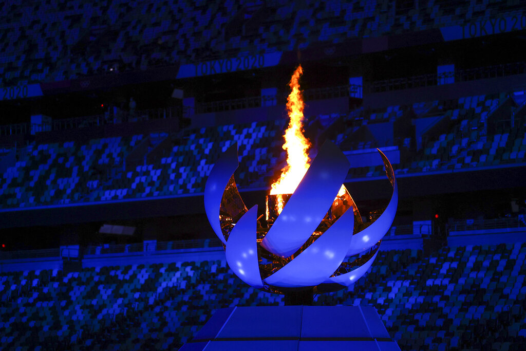 The cauldron is light at the start of the closing ceremony in the Olympic Stadium at the 2020 Summer Olympics, Sunday, Aug. 8, 2021, in Tokyo, Japan. (Dan Mullen/Pool Photo via AP))