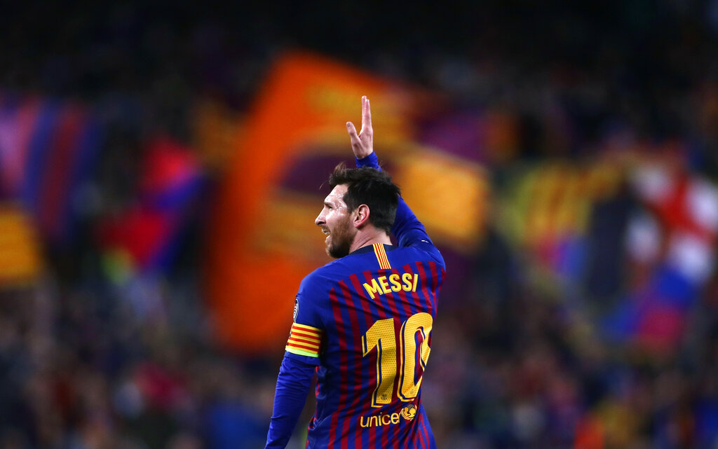 FILE - In this April 16, 2019 file photo Barcelona forward Lionel Messi celebrates after scoring his side's second goal during the Champions League quarterfinal, second leg, soccer match between FC Barcelona and Manchester United at the Camp Nou stadium in Barcelona, Spain. (AP Photo/Manu Fernandez, File)