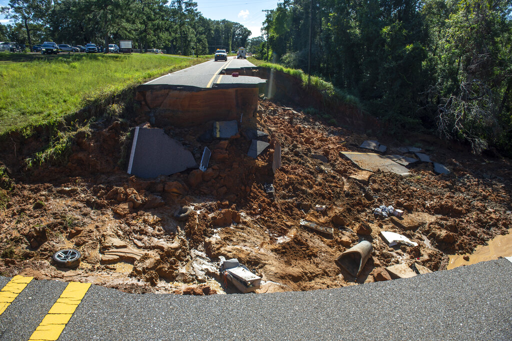 A portion of Highway 26 in the Benndale community in George County washed out Monday night after Hurricane Ida brought torrential rains through the area on Tuesday, Aug. 31, 2021. (Hannah Ruhoff/The Sun Herald via AP)