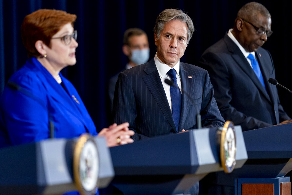 Australian Foreign Minister Marise Payne, left, accompanied by Secretary of State Antony Blinken, second from right, and Defense Secretary Lloyd Austin, right, speaks at a news conference at the State Department in Washington, Thursday, Sept. 16, 2021. (AP Photo/Andrew Harnik, Pool)
