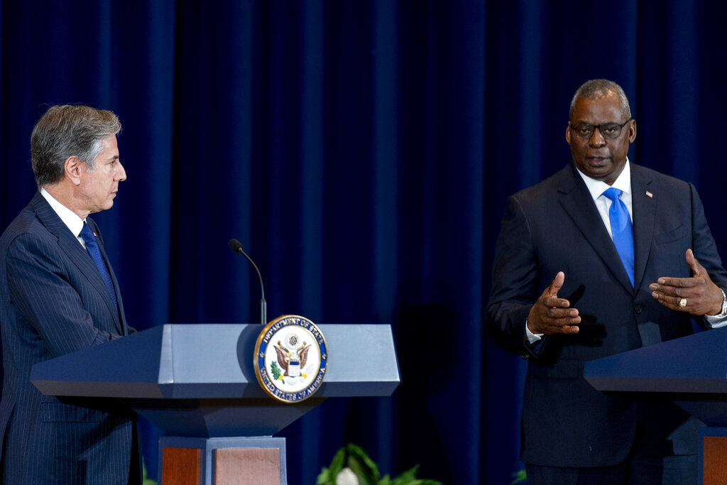 Defense Secretary Lloyd Austin, accompanied by Secretary of State Antony Blinken, left, speaks at a news conference with Australian Minister of Defense Peter Dutton, and Australian Foreign Minister Marise Payne at the State Department in Washington, Thursday, Sept. 16, 2021. (AP Photo/Andrew Harnik, Pool)