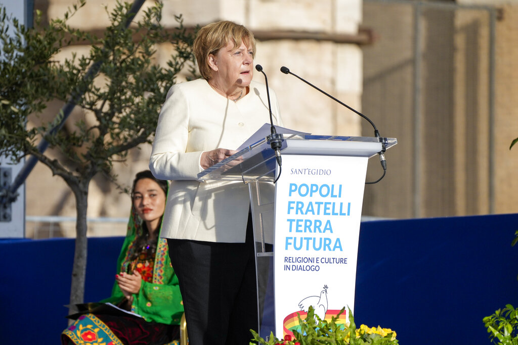 German Chancellor Angela Merkel delivers her speech at the interreligious meeting 'Brother peoples, future land
