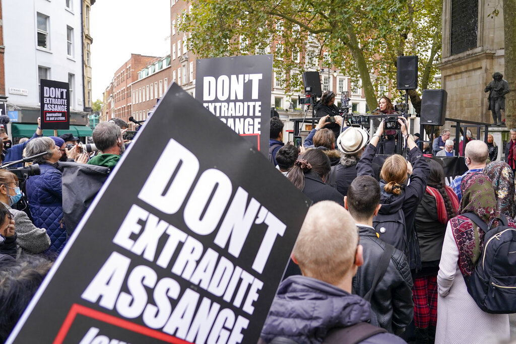 WikiLeaks founder Julian Assange's partner Stella Morris delivers a speech outside the Royal Courts of Justice, in London, Saturday, Oct. 23, 2021, ahead of next week's extradition case appeal. (AP Photo/Alberto Pezzali)