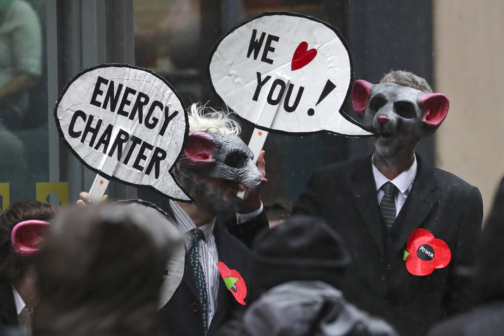 Climate activists dressed as rats attend a protest organized by the Cop26 Coalition in Glasgow, Scotland, Saturday, Nov. 6, 2021 which is the host city of the COP26 U.N. Climate Summit. The protest was taking place as leaders and activists from around the world were gathering in Scotland's biggest city for the U.N. climate summit, to lay out their vision for addressing the common challenge of global warming. (AP Photo/Scott Heppell)