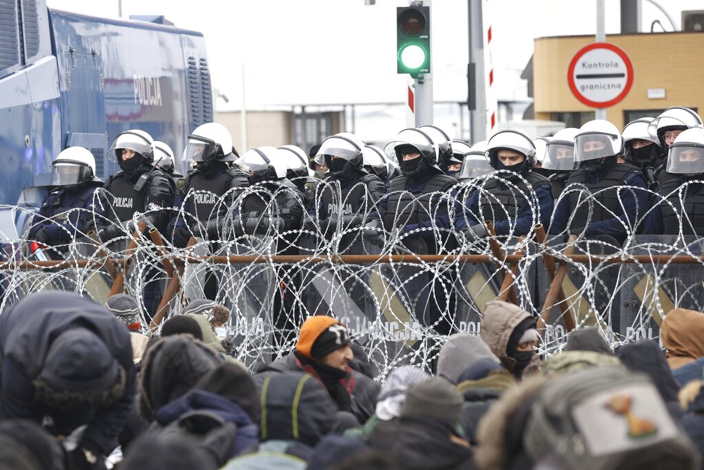 Europa Migrants(Oksana Manchuk/BelTA pool photo via AP)