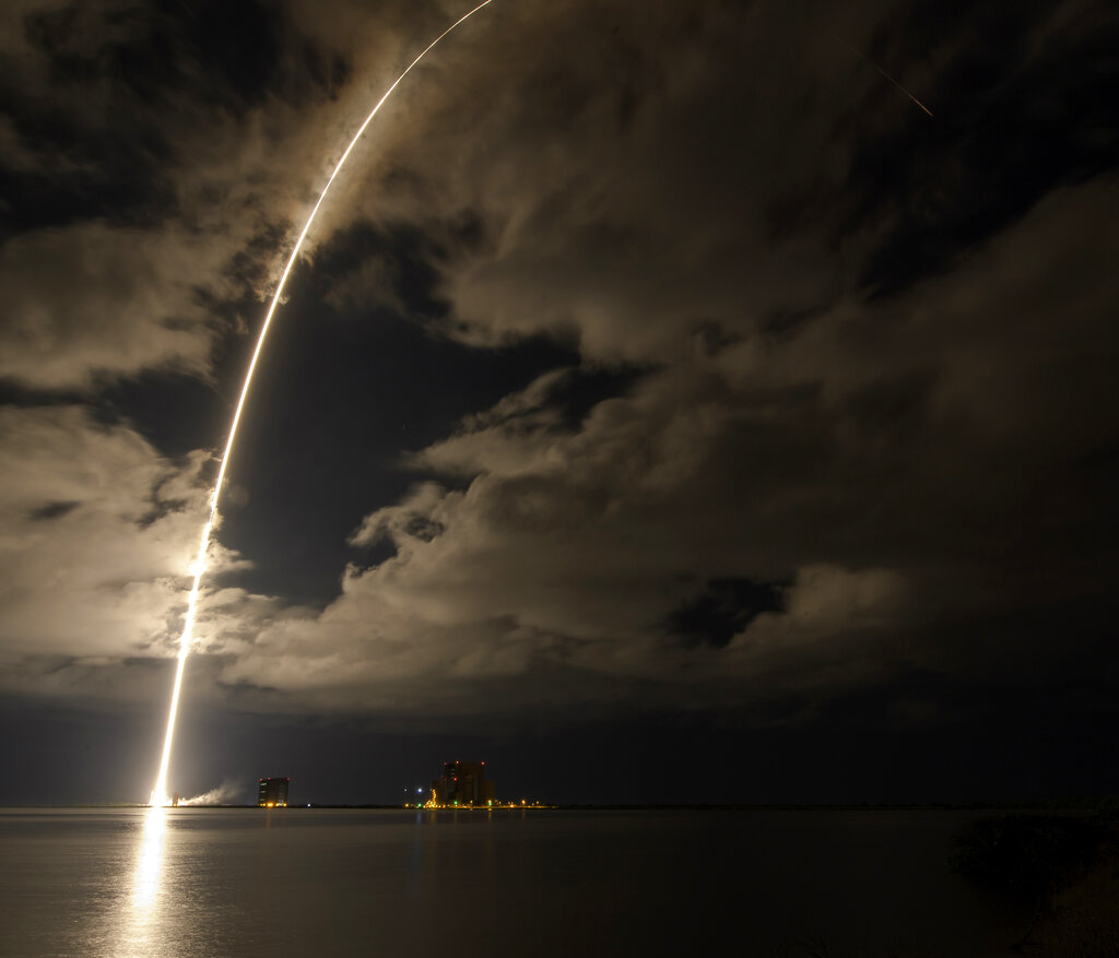 This photo released by NASA, shows a United Launch Alliance Atlas V rocket with the Lucy spacecraft aboard in this 2 minute and 30 second exposure photo as it launches from  Space Launch Complex 41, Saturday, Oct. 16, 2021, at Cape Canaveral Space Force Station in Florida. Lucy will be the first spacecraft to study Jupiter's Trojan Asteroids. Like the mission's namesake – the fossilized human ancestor, 