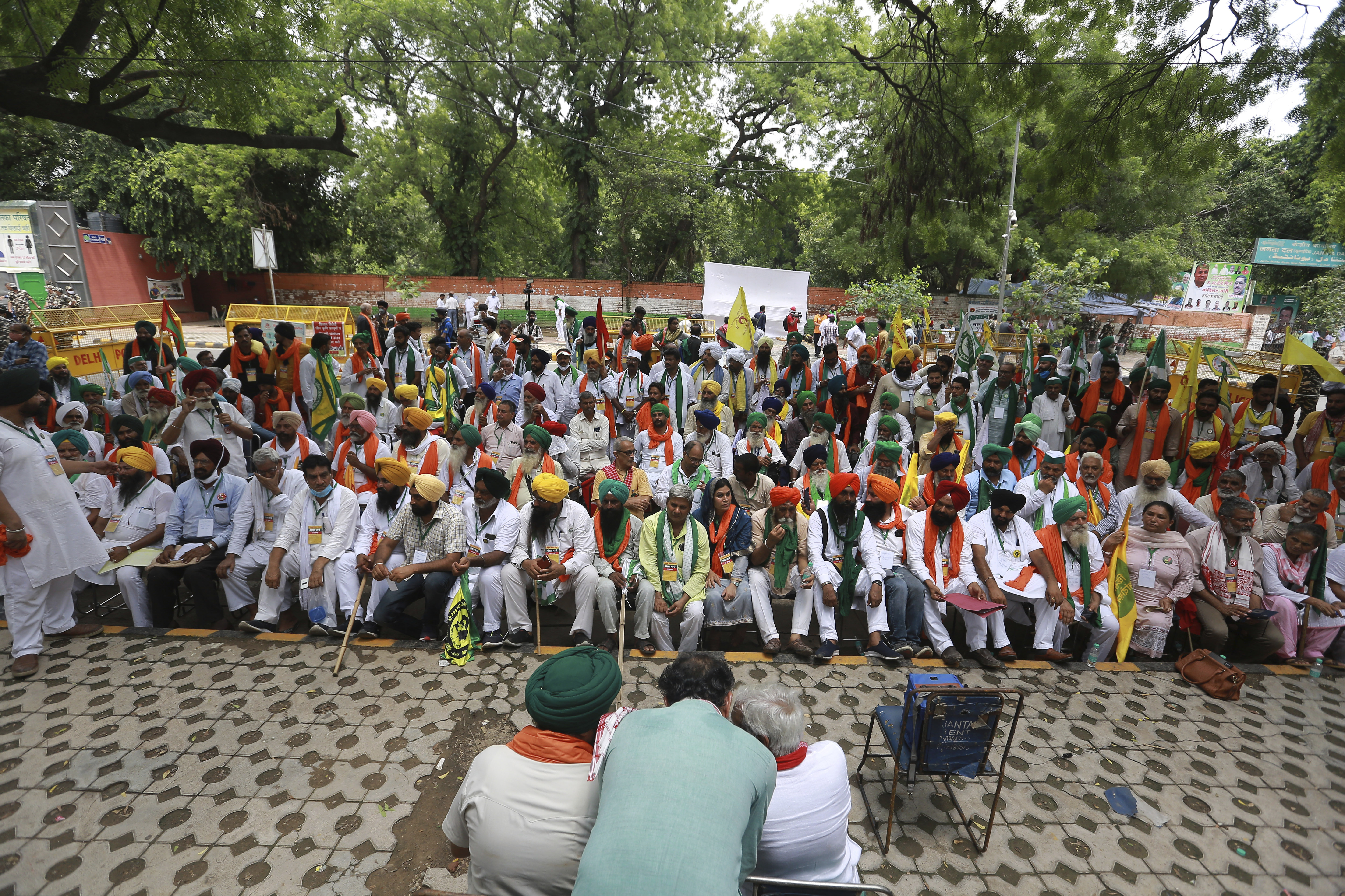 Indian farmers hold a mock parliament as a mark of protest, in New Delhi, India, Thursday, July 22, 2021. More than 200 farmers on Thursday began a protest near India's Parliament to mark eight months of their agitation against new agricultural laws that they say will devastate their income. (AP Photo)