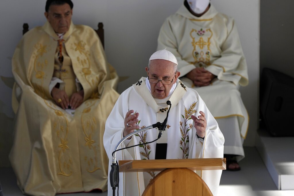 Pope Francis leads a holy mass at GSP stadium in Nicosia, Cyprus, Friday, Dec. 3, 2021. Francis is on a five-day trip to Cyprus and Greece by drawing attention once again to his call for Europe to welcome migrants. (AP Photo/Alessandra Tarantino)