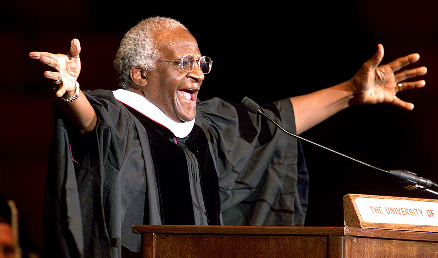 FILE - Archbishop Emeritus Desmond Tutu addresses new University of Oklahoma graduates, at a ceremony at the university after he received a honorary degree, Tuesday April 25, 2000 in Norman, Okla.  Tutu, South Africa’s Nobel Peace Prize-winning activist for racial justice and LGBT rights and retired Anglican Archbishop of Cape Town, has died at the age of 90, South African President Cyril Ramaphosa has announced. (AP Photo/J. Pat Carter, File)