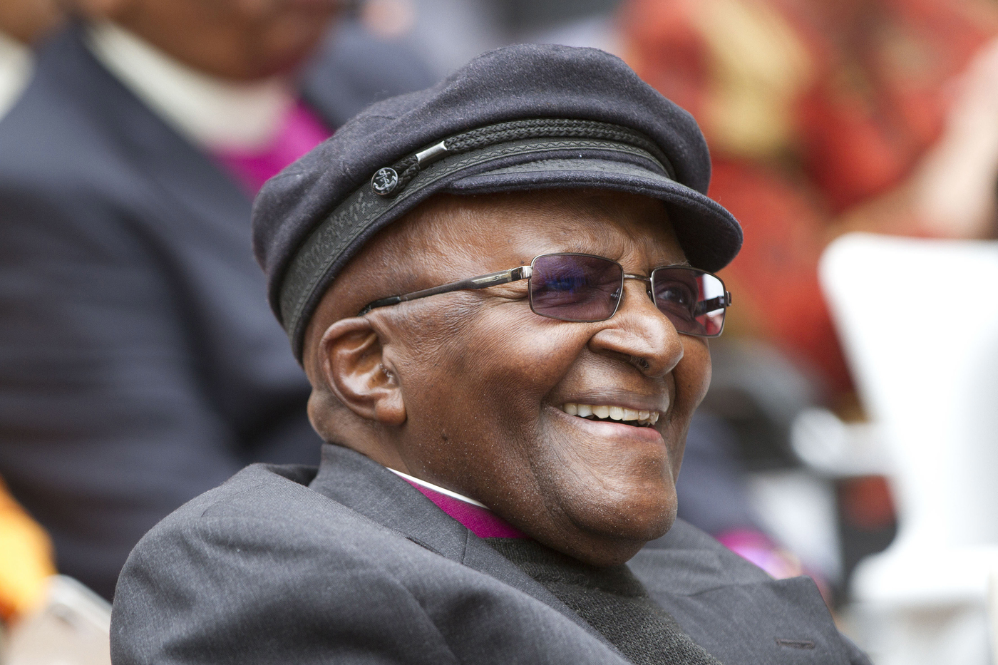 FILE - Anglican Archbishop Emeritus Desmond Tutu smiles as he celebrates his 86th birthday in Cape Town South Africa, Saturday, Oct. 7, 2017. Tutu, South Africa’s Nobel Peace Prize-winning activist for racial justice and LGBT rights and retired Anglican Archbishop of Cape Town, has died, South African President Cyril Ramaphosa announced Sunday Dec. 26, 2021. He was 90. (AP Photo/Mark Wessels, File)