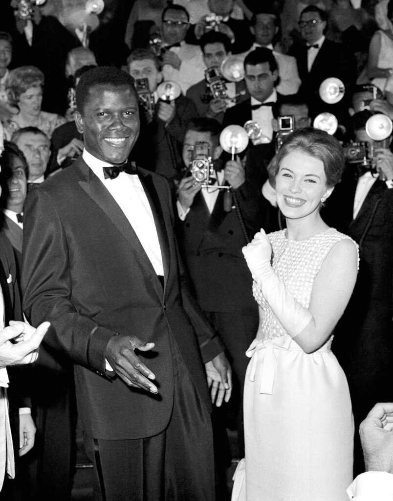 REMOVES REFERENCE TO THE BAHAMAS - FILE - Actors Sidney Poitier, left, and Jean Seberg appear at the Cannes Film Festival, Cannes, France, for the showing of his film 