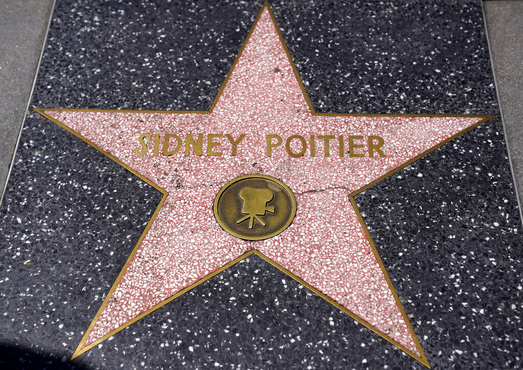 REMOVES REFERENCE TO THE BAHAMAS - Actor Sidney Poitier's star on the Hollywood Walk of Fame is pictured on Sept. 1, 2020, in Los Angeles.  Poitier, the groundbreaking actor and enduring inspiration who transformed how Black people were portrayed on screen, became the first Black actor to win an Academy Award for best lead performance and the first to be a top box-office draw, died Thursday, Jan. 6, 2022. He was 94. (AP Photo/Chris Pizzello, File)