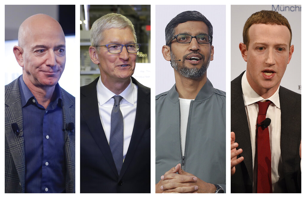 FILE - This combination of 2019-2020 file photos shows Amazon CEO Jeff Bezos, Apple CEO Tim Cook, Google CEO Sundar Pichai and Facebook CEO Mark Zuckerberg. A group of House lawmakers put forward a sweeping legislative package Friday that could curb the market power of Big Tech companies and force Facebook, Google, Amazon or Apple to sever their dominant platforms from their other lines of business. (AP Photo, File)