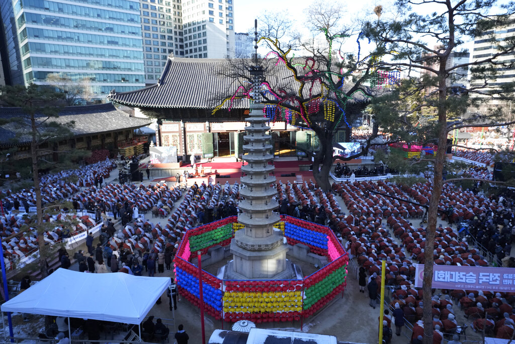 South Korean Buddhist monks stage a rally against government's policy at the Jogye temple in Seoul, South Korea, Friday, Jan. 21, 2022. Thousands of Buddhist monks gathered to protest alleged religious discrimination by South Korean government. (AP Photo/Ahn Young-joon)