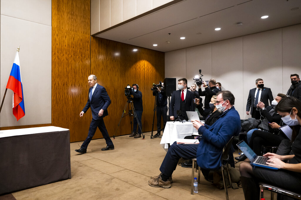 Russian Foreign Minister Sergei Lavrov arrives for a press conference following talks with United States Secretary of State Antony Blinken in Geneva, Switzerland, Friday, Jan. 21, 2022. (Jean-Christophe Bott/Keystone via AP)