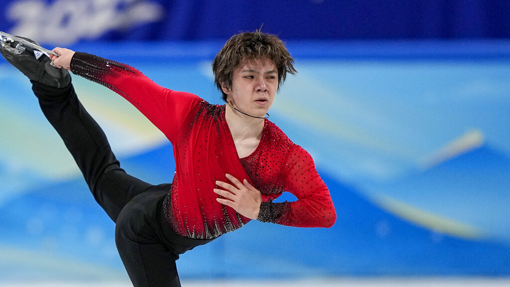 Shoma Uno, of Japan, competes during the men's singles short program team event in the figure skating competition at the 2022 Winter Olympics, Friday, Feb. 4, 2022, in Beijing. (AP Photo/David J. Phillip)
