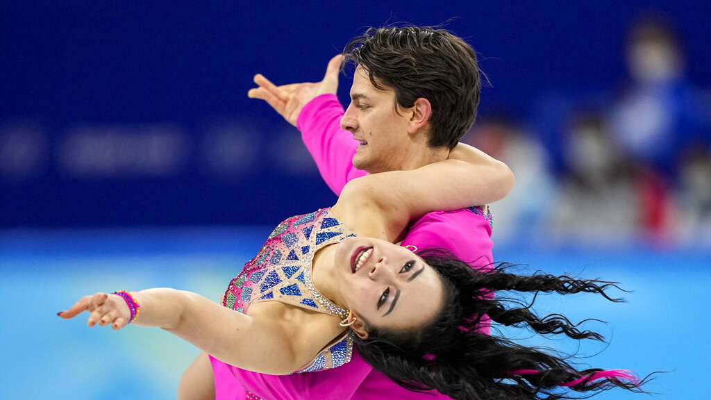Misato Komatsubara and Tim Koleto, of Japan, compete during the ice dance team program in the figure skating competition at the 2022 Winter Olympics, Friday, Feb. 4, 2022, in Beijing. (AP Photo/David J. Phillip)