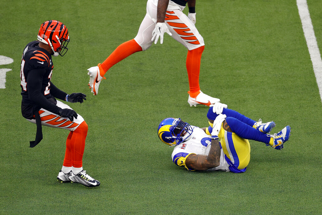 Los Angeles Rams wide receiver Odell Beckham Jr. (3) goes down while holding his knee during the first half of the NFL Super Bowl 56 football game against the Cincinnati Bengals, Sunday, Feb. 13, 2022 in Inglewood, CA. (AP Photo/Tyler Kaufman)