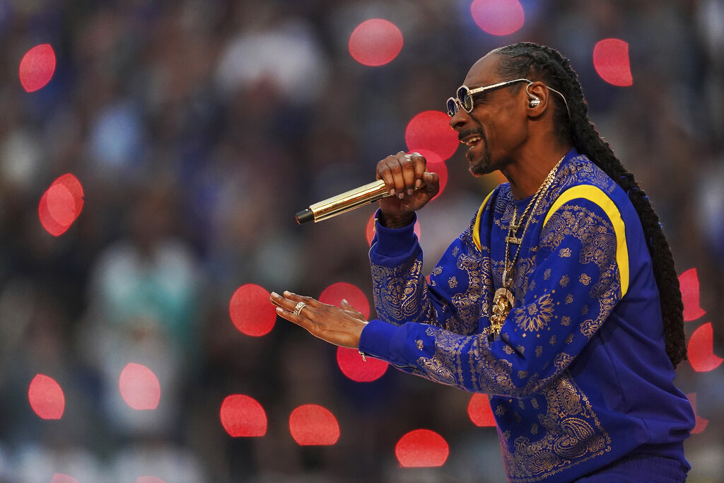 Snoop Dogg performs during halftime of the game between the Los Angeles Rams and Cincinnati Bengals in Super Bowl 56, Sunday, Feb. 13, 2022 in Inglewood, Calif. (AP Photo/Doug Benc)