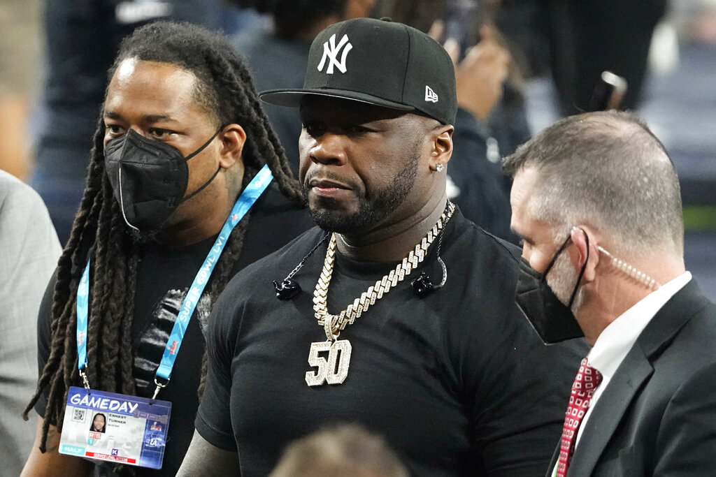 50 Cent arrives during halftime of the NFL Super Bowl 56 football game between the Los Angeles Rams and the Cincinnati Bengals, Sunday, Feb. 13, 2022, in Inglewood, Calif. (AP Photo/Tony Gutierrez)