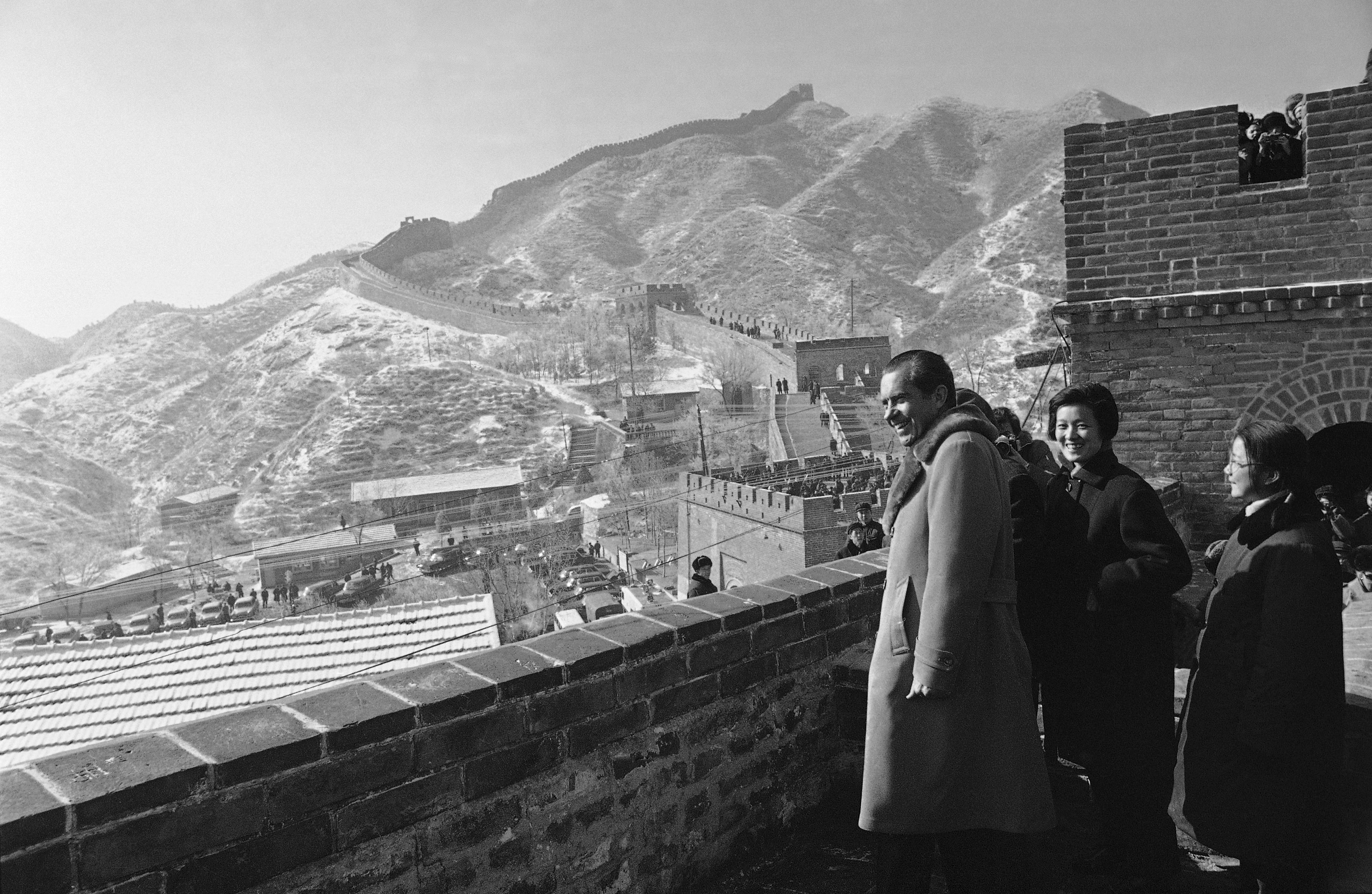 FILE - In this Feb. 24, 1972, file photo, President Richard Nixon, with Chinese guides and interpreters, stands on the Great Wall of China outside Peking. Richard Nixon made the historic journey to meet Chinese leader Mao Zedong in part paved by a U.S. pingpong delegation that traveled to Beijing a year earlier. (AP Photo/File)
