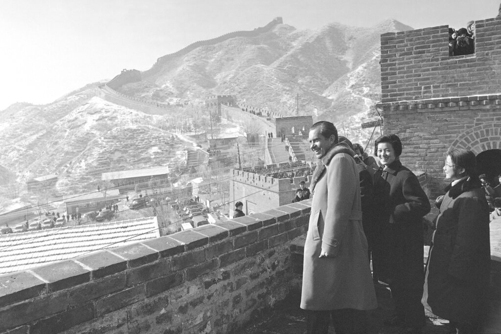 FILE - In this Feb. 24, 1972, file photo, U.S. President Richard Nixon with Chinese guides and interpreters stand on the Great Wall of China on the outskirts of Beijing. Four decades after the U.S. established diplomatic ties with communist China, the relationship between the two is at a turning point. (AP Photo/File)