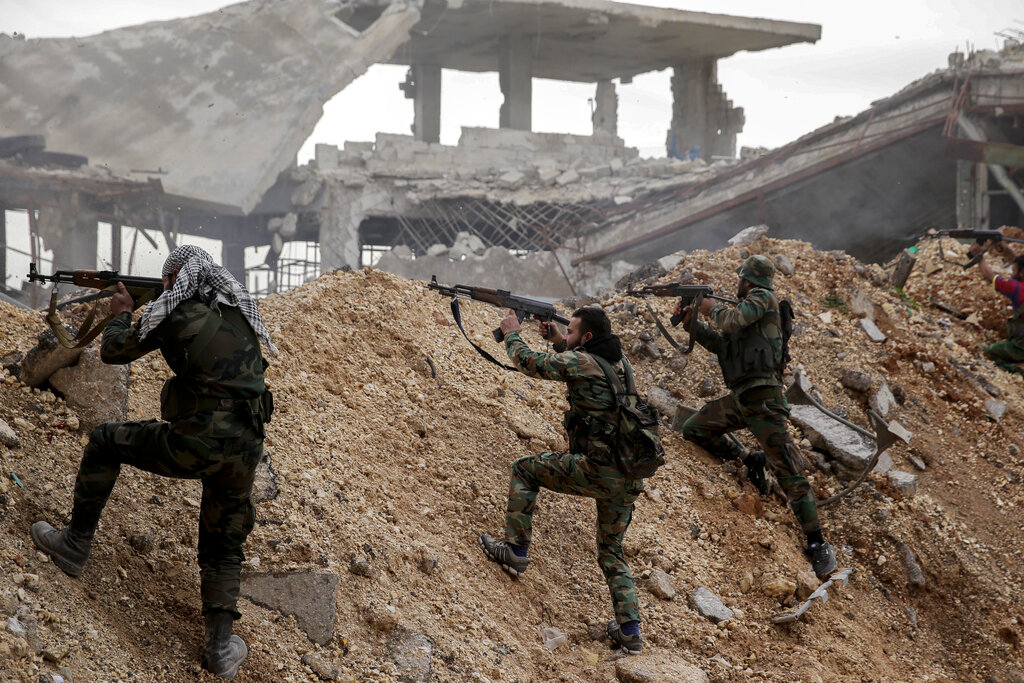 Ucraian Siria (AP Photo/Hassan Ammar, File)