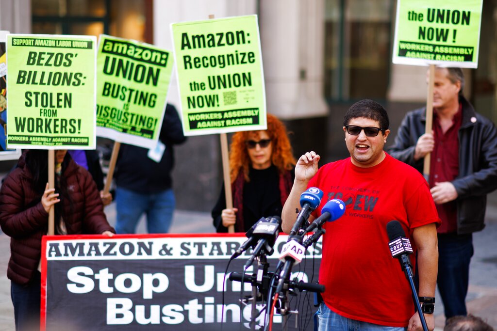 Amazon JFK8 distribution center union organizer Jason Anthony speaks to media on Friday, April 1, 2022,  in the Brooklyn borough of New York.  Amazon workers in Staten Island, N.Y. voted to unionize on Friday, marking the first successful U.S. organizing effort in the retail giant’s history and handing an unexpected win to a nascent group that fueled the union drive.    (AP Photo/Eduardo Munoz Alvarez)