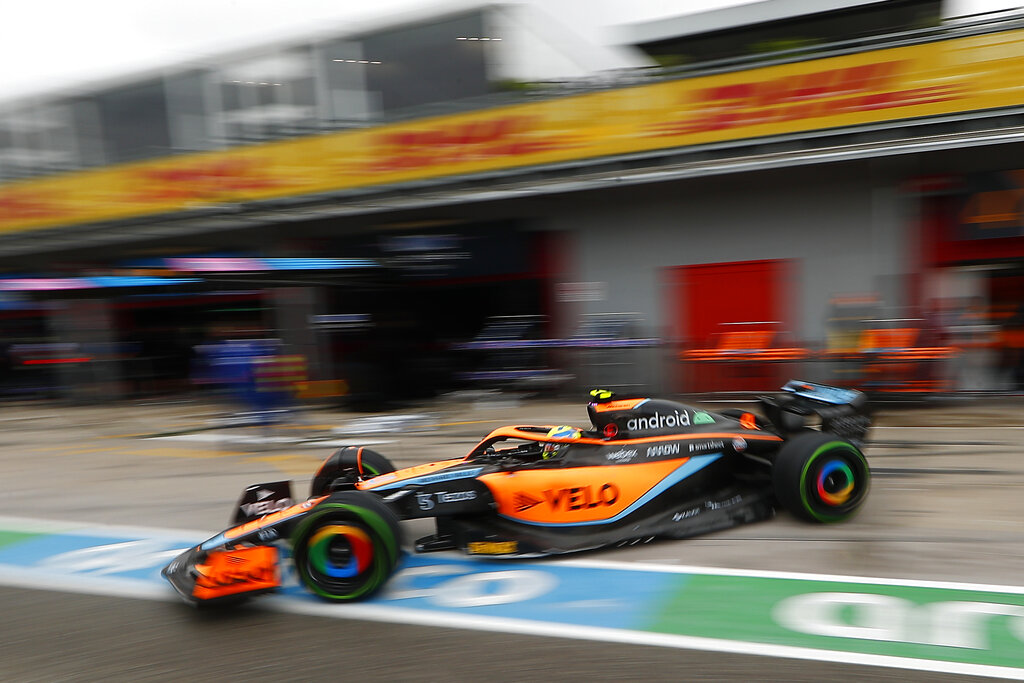 Mclaren driver Lando Norris of Britain steers his car at pit line during the qualifying session for Sunday's Emilia Romagna Formula One Grand Prix, at the Dino and Enzo Ferrari racetrack in Imola, Italy, Friday, April 22, 2022. (Guglielmo Mangiapane, Pool via AP)