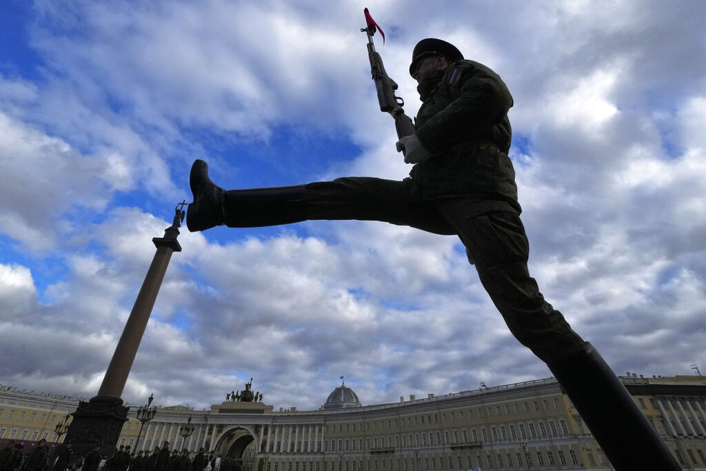 A honour guard soldier marches during a rehearsal for the Victory Day military parade which will take place at Dvortsovaya (Palace) Square on May 9 to celebrate 77 years after the victory in World War II in St. Petersburg, Russia, Tuesday, April 26, 2022. (AP Photo/Dmitri Lovetsky)