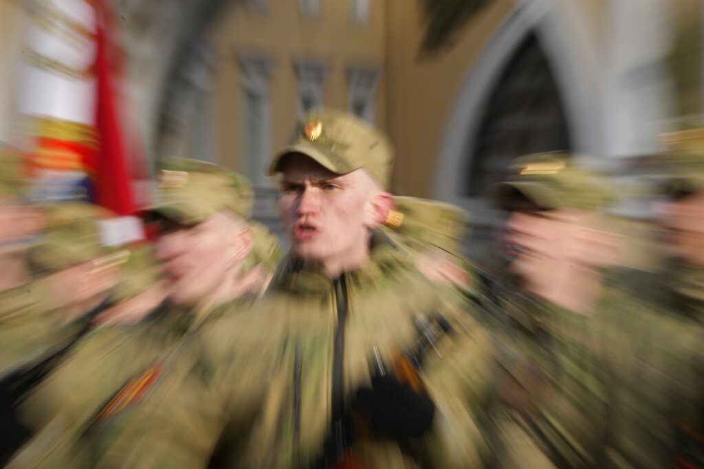 Troops march and sing during a rehearsal for the Victory Day military parade which will take place at Dvortsovaya (Palace) Square on May 9 to celebrate 77 years after the victory in World War II in St. Petersburg, Russia, Tuesday, April 26, 2022. (AP Photo/Dmitri Lovetsky)