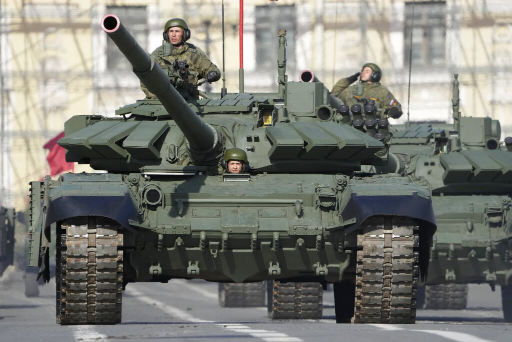 Russian army tanks drive during a rehearsal for the Victory Day military parade which will take place at Dvortsovaya (Palace) Square on May 9 to celebrate 77 years after the victory in World War II in St. Petersburg, Russia, Thursday, April 28, 2022. (AP Photo/Dmitri Lovetsky)