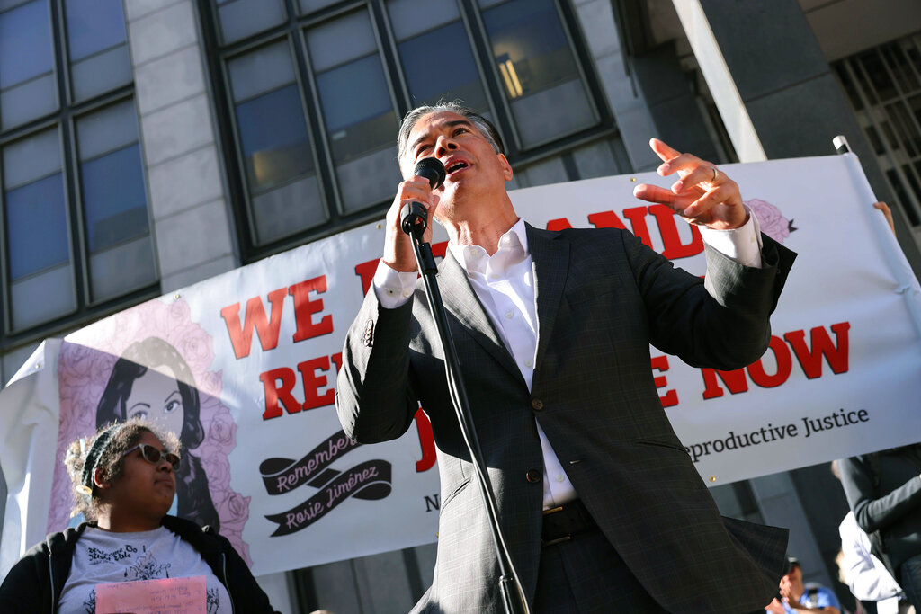 CORRECTS SPELLING OF PHOTOGRAPHER'S FIRST NAME TO YALONDA INSTEAD OF YOLANDA - California Attorney General Rob Bonta speaks during a protest about the Supreme Court's decision to overthrow Roe v. Wade while standing outside the Phillip Burton Federal Building, Tuesday, May 3, 2022, in San Francisco. (Yalonda M. James/San Francisco Chronicle via AP)